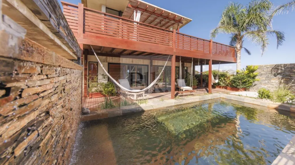 Casa en Punta Piedras by Arq. Martín Gómez · Casa en Punta Piedras
